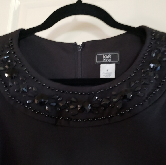 A black casual dress, sz 8, embellished with large gemstones, suitable for Fall - Picture 4 of 9